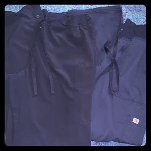 Two black scrub pants 👩🏼‍⚕️